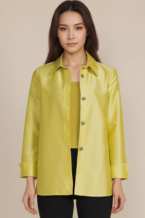 Woman wearing a yellow jacket from IC Collection with button front closure