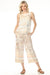 Woman wearing vintage atlas printed wide leg pants with cropped length from Charlie B