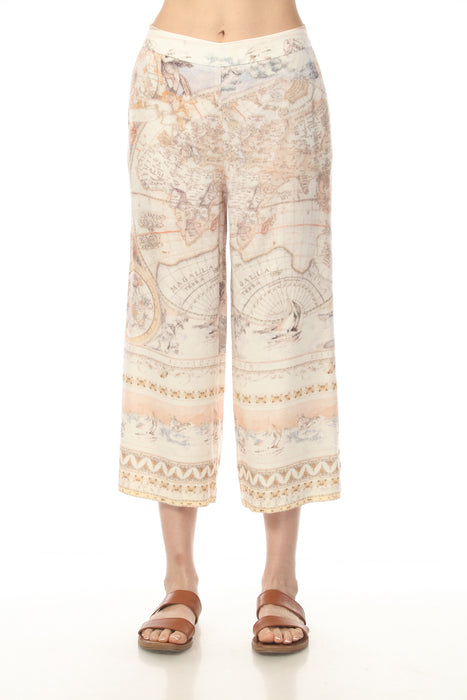 Woman wearing vintage atlas printed wide leg pants with cropped length from Charlie B
