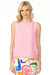 Woman wearing pink sleeveless top with round neck and side ties from Charlie B
