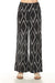 Black wide-leg pants with white diamond pattern from Charlie B