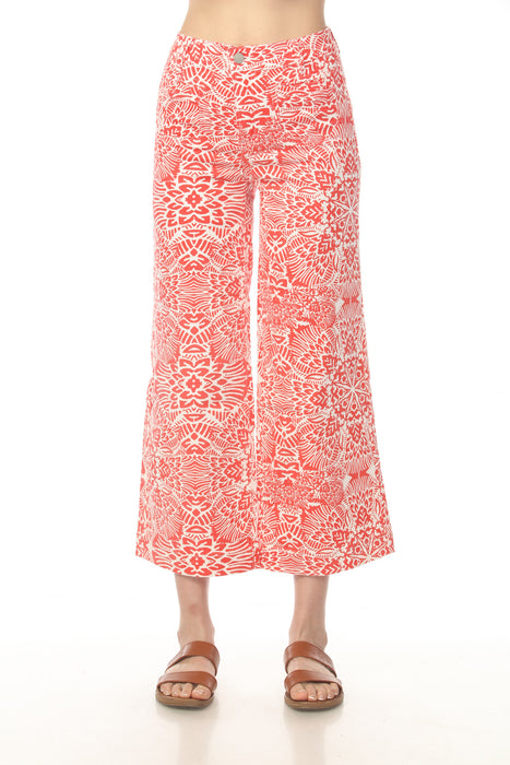 Woman wearing red patterned cropped flare jeans with patch pockets from Charlie B