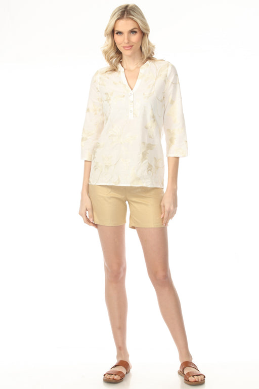 Woman wearing a gold foiled linen shorts with front patch pockets from Charlie B