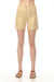 Woman wearing a gold foiled linen shorts with front patch pockets from Charlie B