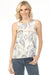 Woman wearing a paisley patterned tank top from Charlie B