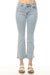 Woman wearing light blue cropped flare leg jeans with button and zip closure from Charlie B