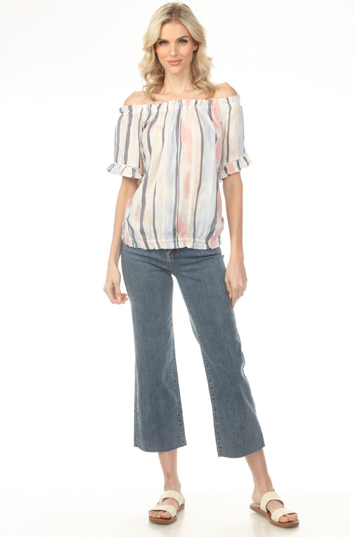 Woman wearing blue cropped jeans with flared leg from Charlie B