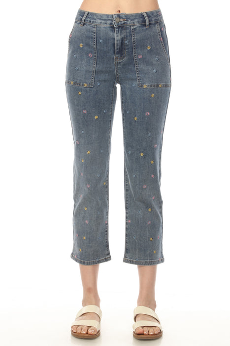 Woman wearing blue denim cropped jeans with mini floral embroidery and narrow leg from Charlie B