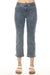 Woman wearing blue denim cropped jeans with mini floral embroidery and narrow leg from Charlie B