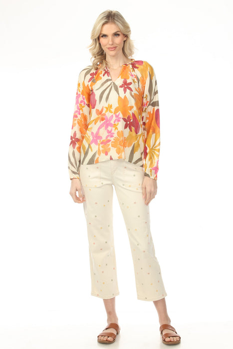 Woman wearing beige cropped jeans with scattered floral embroideries and narrow leg from Charlie B