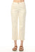 Woman wearing beige cropped jeans with scattered floral embroideries and narrow leg from Charlie B