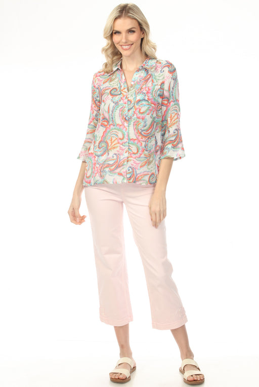 Woman wearing pink pull on cropped jeans with buttoned hem tab and narrow leg from Charlie B