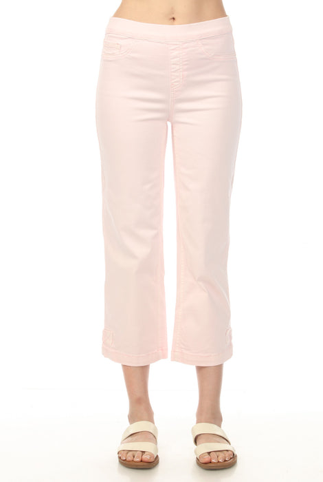 Woman wearing pink pull on cropped jeans with buttoned hem tab and narrow leg from Charlie B