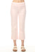 Woman wearing pink pull on cropped jeans with buttoned hem tab and narrow leg from Charlie B