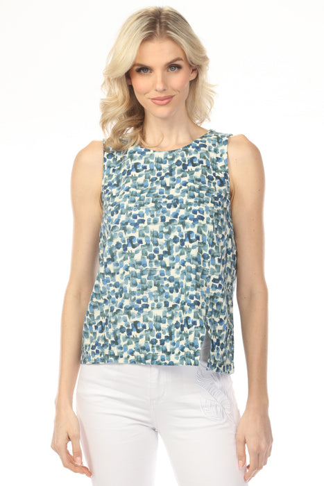 Woman wearing a printed linen blend sleeveless top with off-center slit from Charlie B