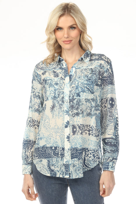 Woman wearing a blue paisley patterned long sleeve top with button front and rounded hem from Charlie B