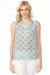 Woman wearing blue printed gauze sleeveless top with v-neck henley with left chest pocket from Charlie B