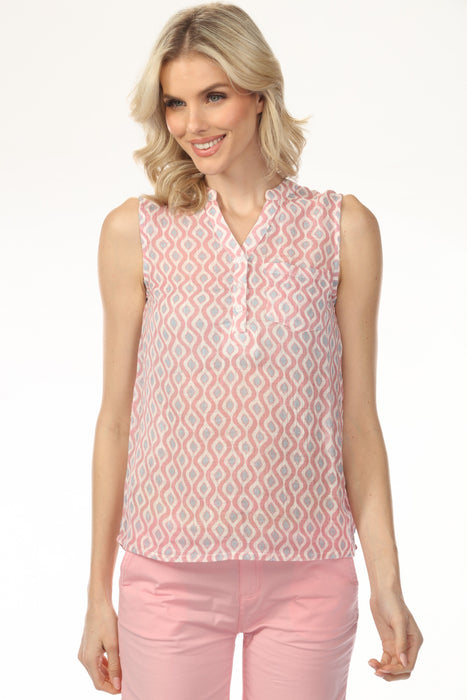 Woman wearing pink printed gauze sleeveless top with v-neck henley with left chest pocket from Charlie B