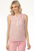 Woman wearing pink printed gauze sleeveless top with v-neck henley with left chest pocket from Charlie B
