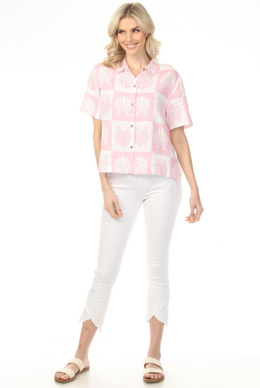 Woman wearing white cropped jeans with frayed tulip hem and embroidery from Charlie B