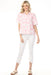 Woman wearing white cropped jeans with frayed tulip hem and embroidery from Charlie B