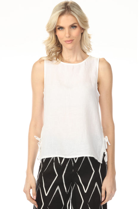 Woman wearing white sleeveless top with round neck and side ties from Charlie B