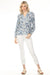 Woman wearing a white slim cropped jeans with fringe embroidered hem from Charlie B