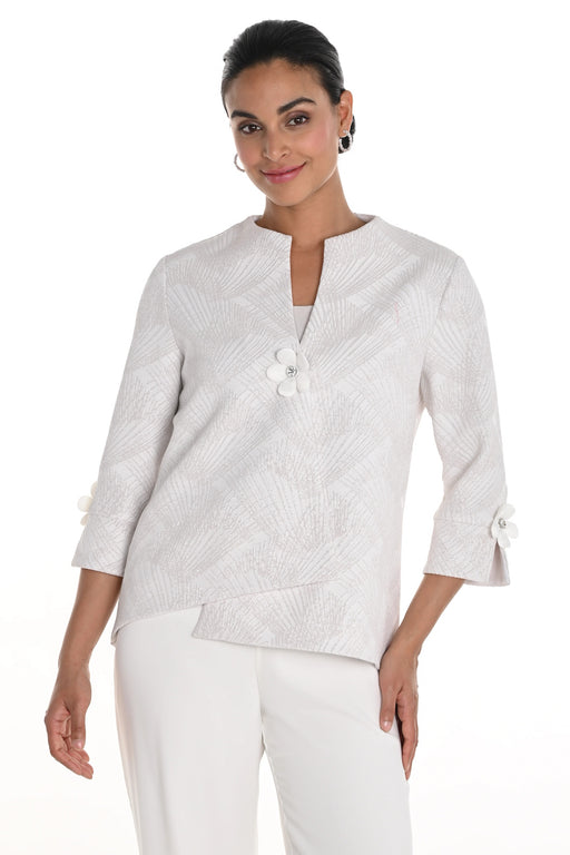 Woman wearing a silver textured jacket with flower detail and swing hem from Frank Lyman