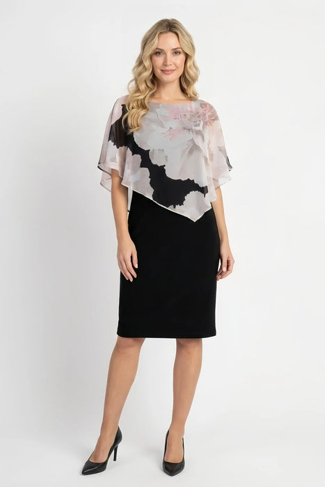 Woman wearing a black sheath dress with asymmetric floral-patterned chiffon overlay from Frank Lyman