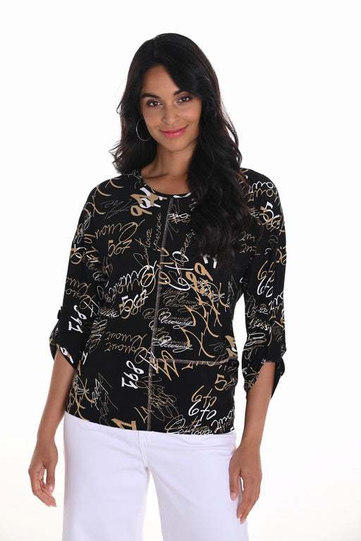 Woman wearing a black top with text print allover and 3/4 roll-tab sleeves from Frank Lyman