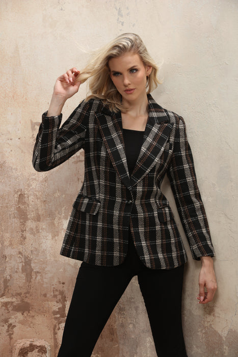 Woman wearing the Insight New York Multi Plaid Moto Jacket featuring classic notched lapels, a fitted waist, structured sleeves, and front flap pockets.