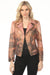 Woman wearing a patterned vegan leather moto jacket with long sleeves from Insight New York