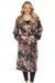 Woman wearing a plush sleep robe, reversible with floral and animal print