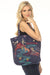 Dark blue tote bag with colorful placement embroideries and double handle from Johnny Was