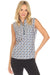 Woman wearing a sleeveless geometric patterned tank top with quarter zip from Johnny Was