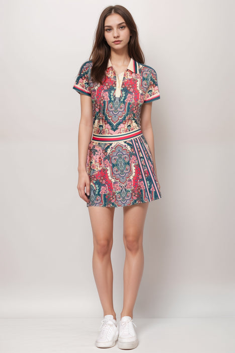 Woman wearing a paisley-patterned tennis skirt with built in short from Johnny Was