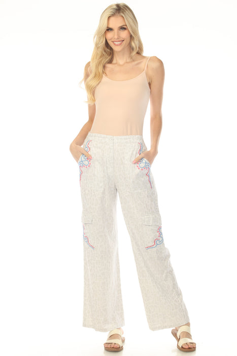 Woman wearing a leopard-patterned cargo pant with embroideries from Johnny Was