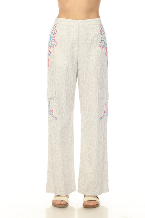 Woman wearing a leopard-patterned cargo pant with embroideries from Johnny Was