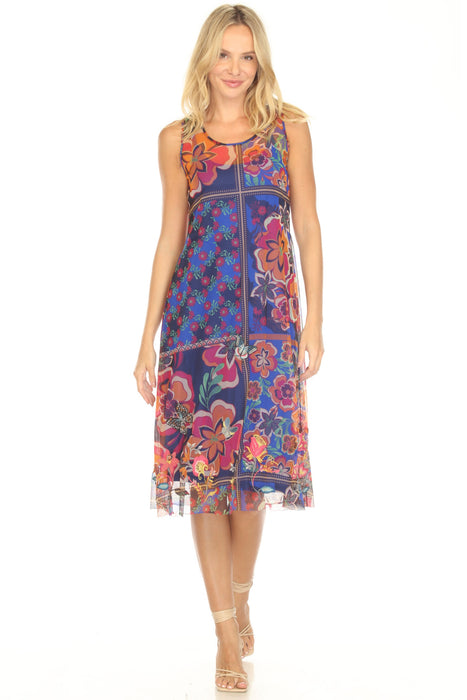 Woman wearing a colorful floral mesh midi dress from Johnny Was