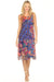 Woman wearing a colorful floral mesh midi dress from Johnny Was