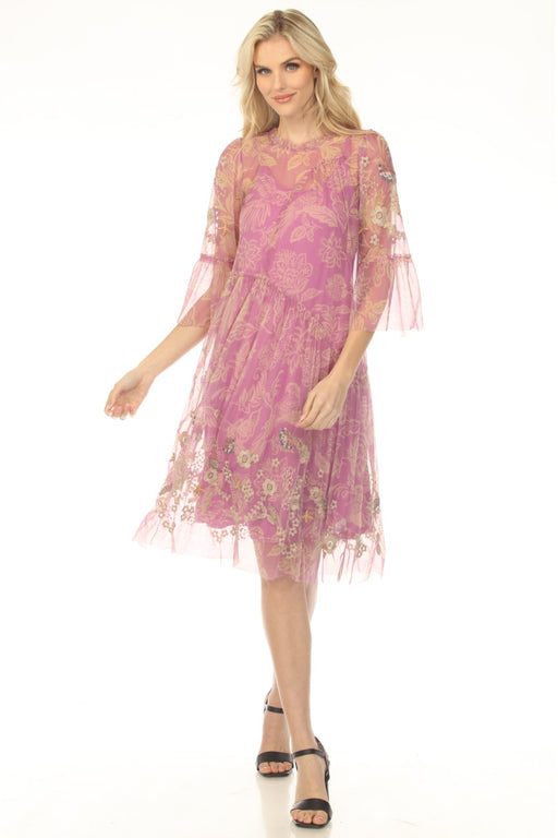Woman wearing a pink printed mesh dress with floral embroidery from Johnny Was