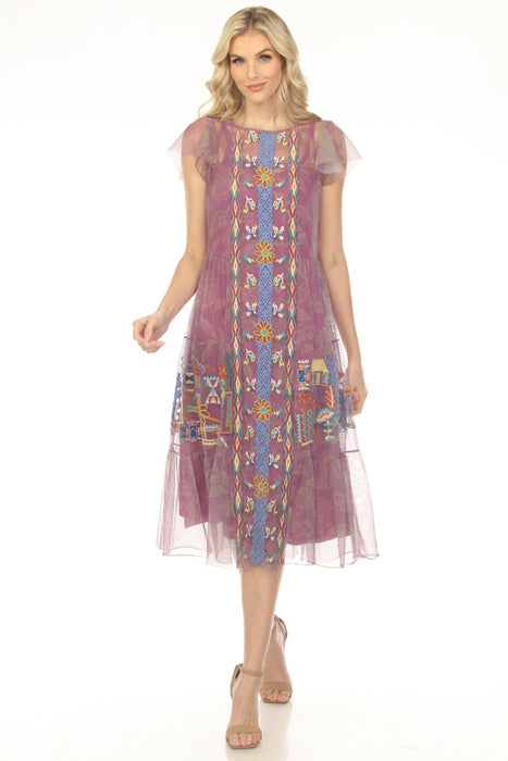 Woman wearing a light purple mesh embroidered midi dress with boat neck and flutter sleeves from Johnny Was