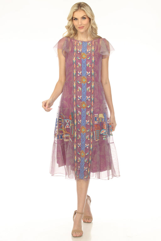 Woman wearing a light purple mesh embroidered midi dress with boat neck and flutter sleeves from Johnny Was