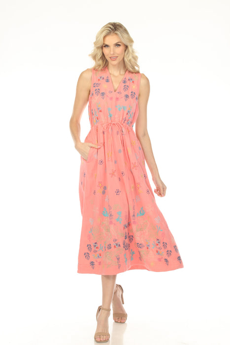 Woman wearing a pink embroidered A-line dress with v-neck, sleeveless, and drawstring waist from Johnny Was