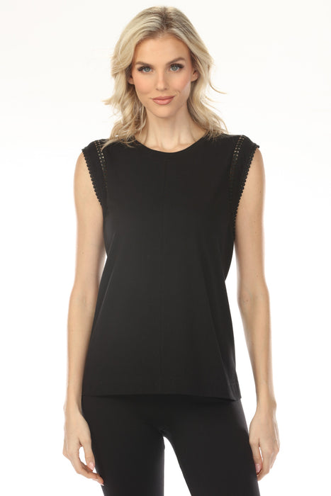Woman wearing a black crew neck sleeveless top with crochet detail on the armholes from Johnny Was