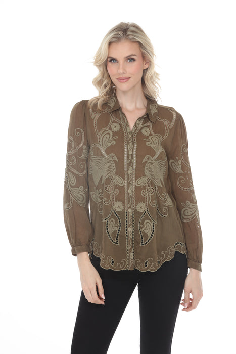 Woman wearing an olive green embroidered shirt with long sleeves and button front from Johnny Was