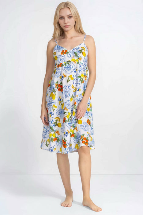 Woman wearing a citrus printed sleep dress from Johnny Was