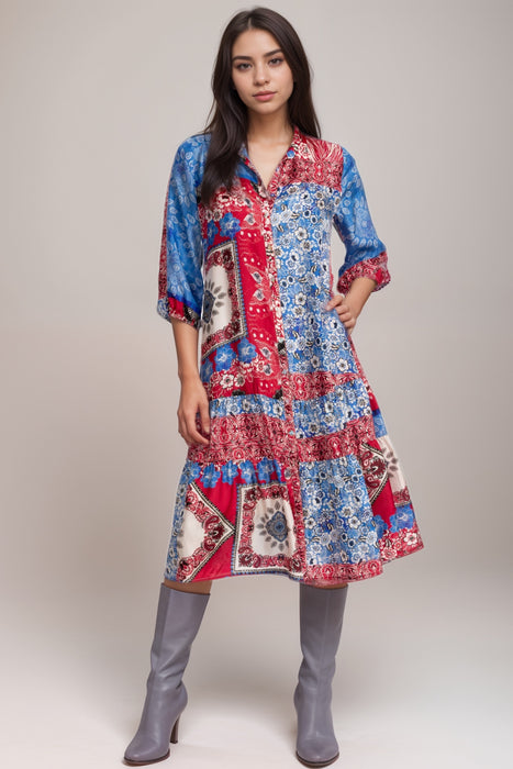 Woman wearing a scarf mix patchwork pattern silk dress in red and blue