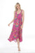Woman wearing a pink midi tank sleep dress with colorful floral print from Johnny Was