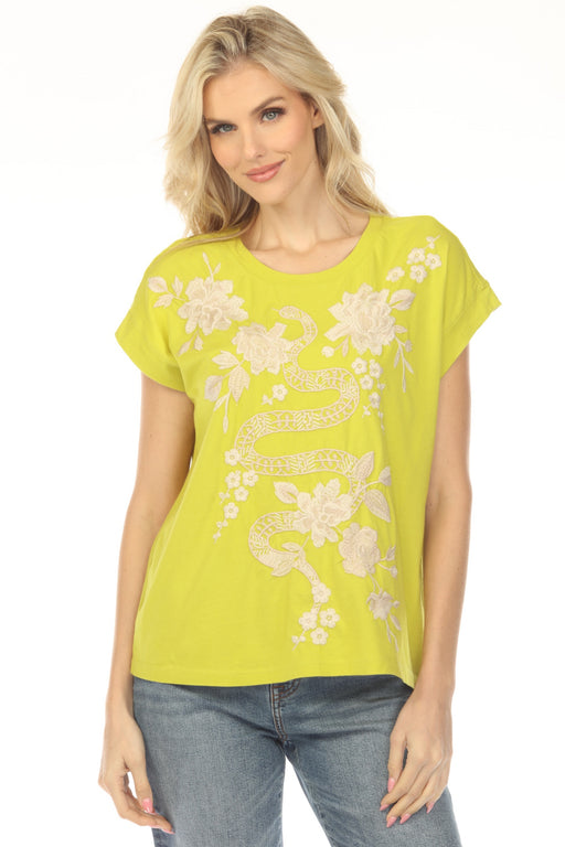 Woman wearing a yellow green floral embroidered top with crew neck and cap sleeves from Johnny Was